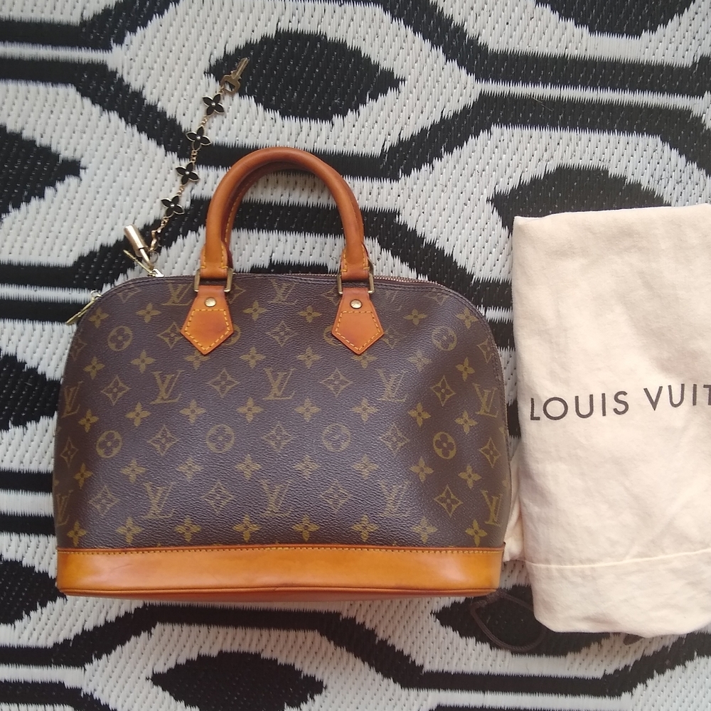 Authentic Louis Vuitton Monogram Alma bag satchel